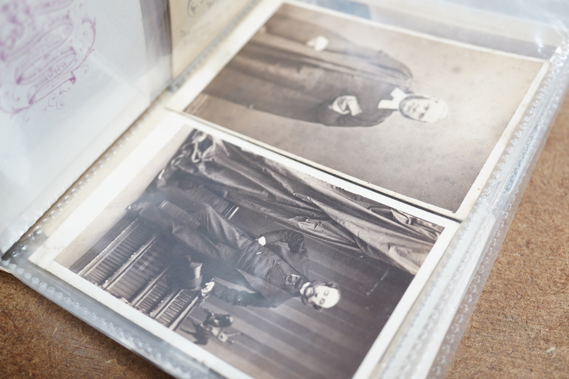 A collection of 19th century carte de visites to include women wearing mourning dress and clergymen. Condition - fair